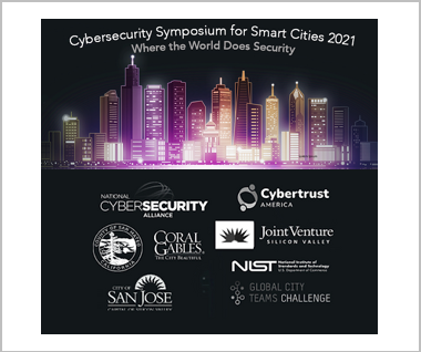 Buildings lit up with lights with logos below